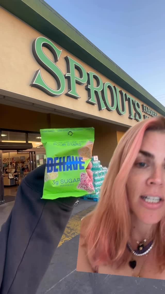 Instagram post by @busyphilipps for BEHAVE. Caption reads: @eatbehave is now in Sprouts!! Go get some Sour....