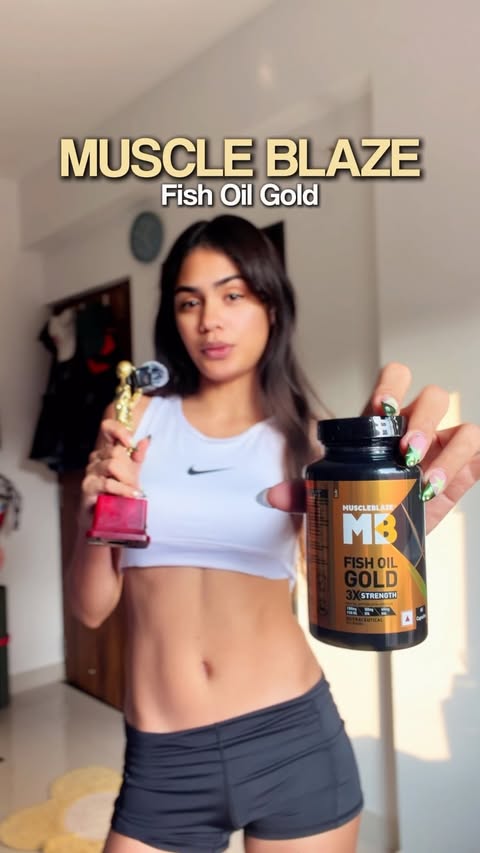 Instagram post by @shimei.nathan for MuscleBlaze. Caption reads: [...] is another. 🏀🫂 Adding @muscleblaze Fish....