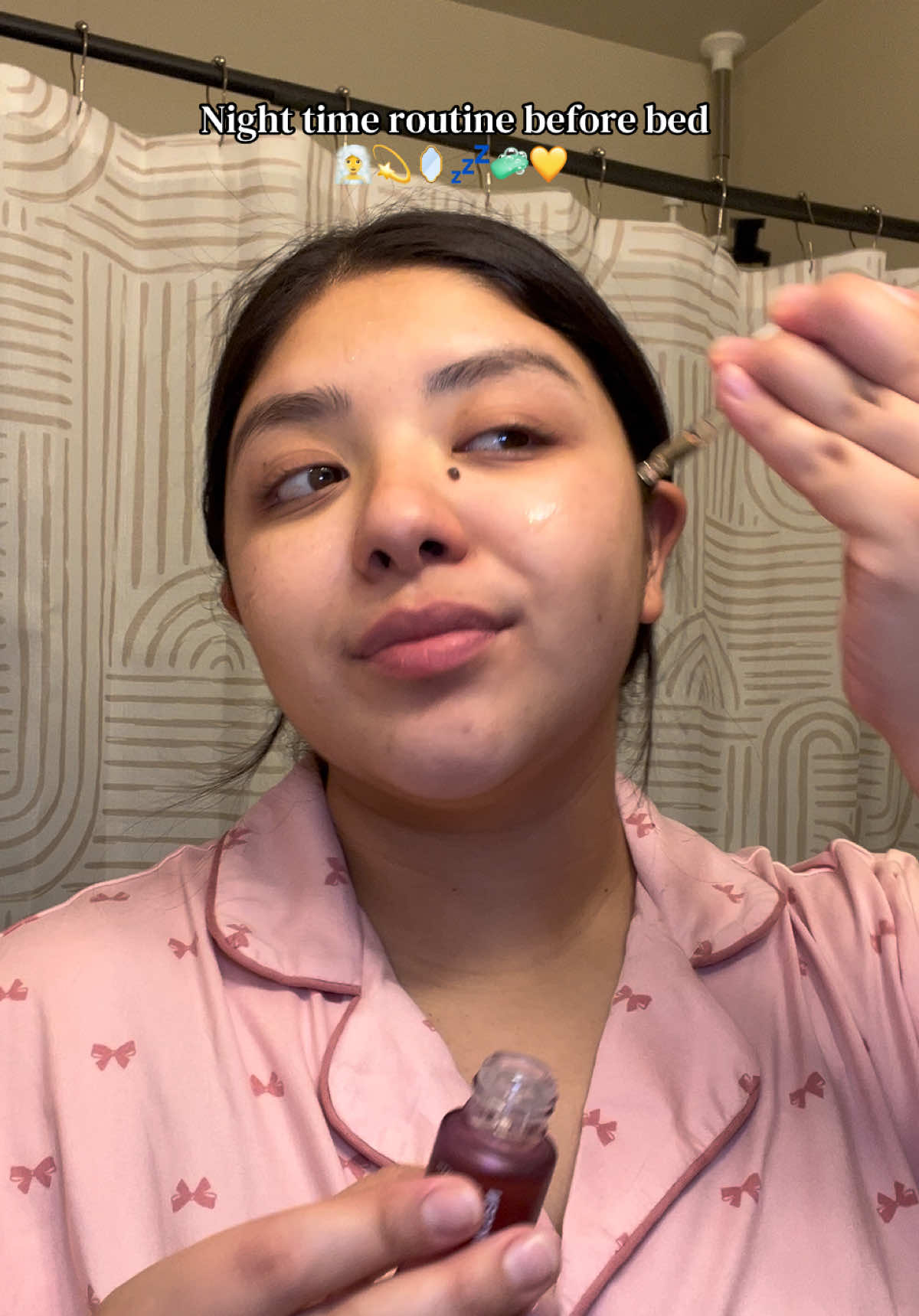 TikTok post by @nicholeeloreen for cleanskinclub. Caption reads: Before bed routine 🌙 skincare + water floss ✨ if....