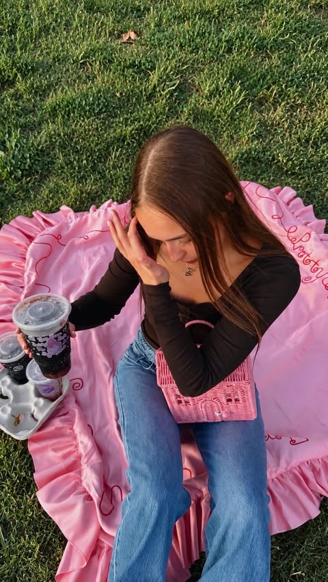 Instagram post by @fulltimefangirl for Taco Bell. Caption reads: my Olivia Rodrigo Taco Bell picnic 🧺🎀🌅 this was....
