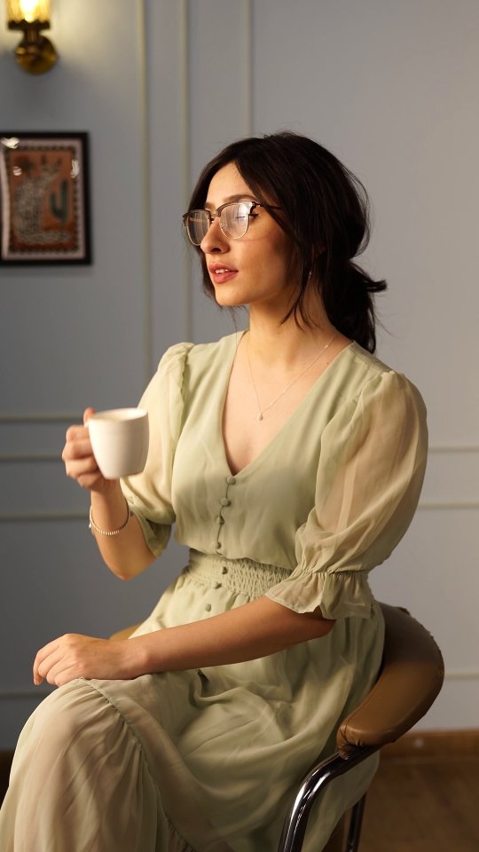 Instagram post by @dotandthesyllables for John Jacobs Eyewear. Caption reads: Slipping on @johnjacobseyewear’s Retro Rhapsody....