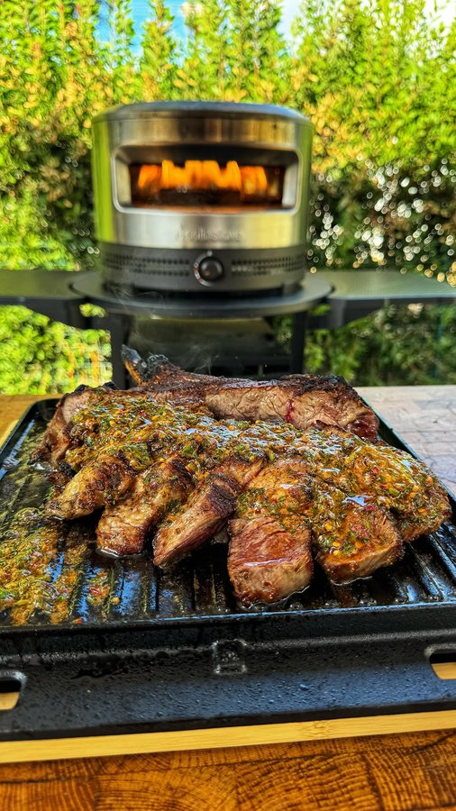Instagram post by an influencer for Solo Stove. Caption reads: [...] level by cooking it in the @solostove pizza....