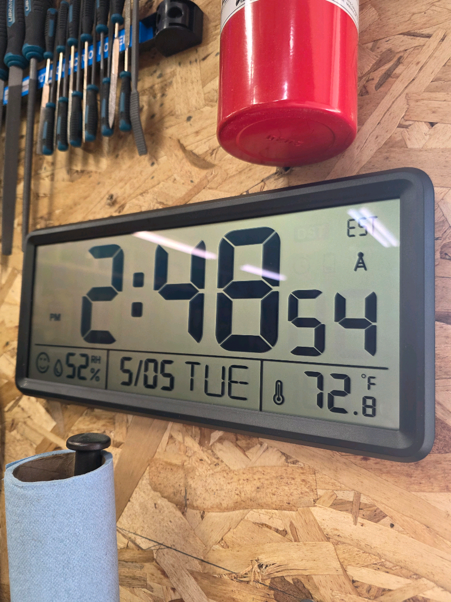TikTok post by @kiernanwoodworks for ecozy Appliances. Caption reads: [...] #digitalclock #atomicwallclock @ecozy....