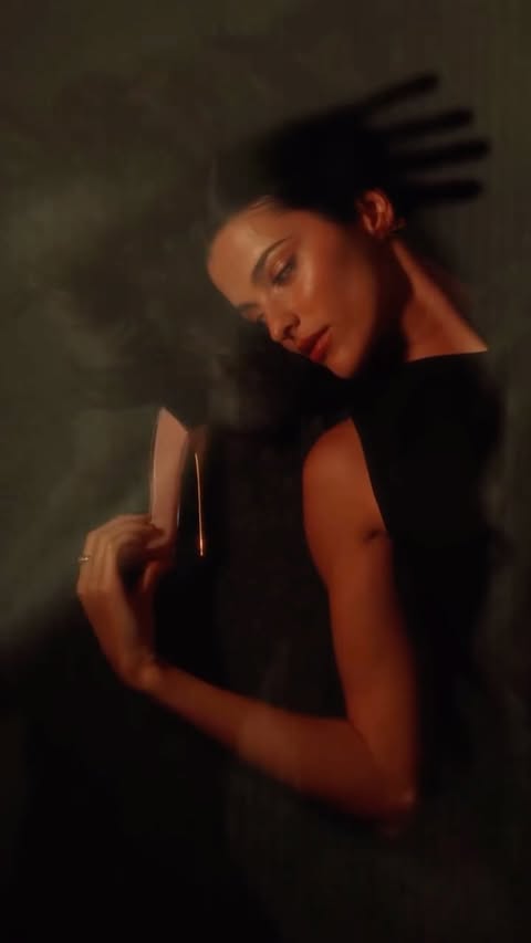 Instagram post by @joana_aguiar_ for Carolina Herrera. Caption reads: pub A delicate touch with undeniable presence....