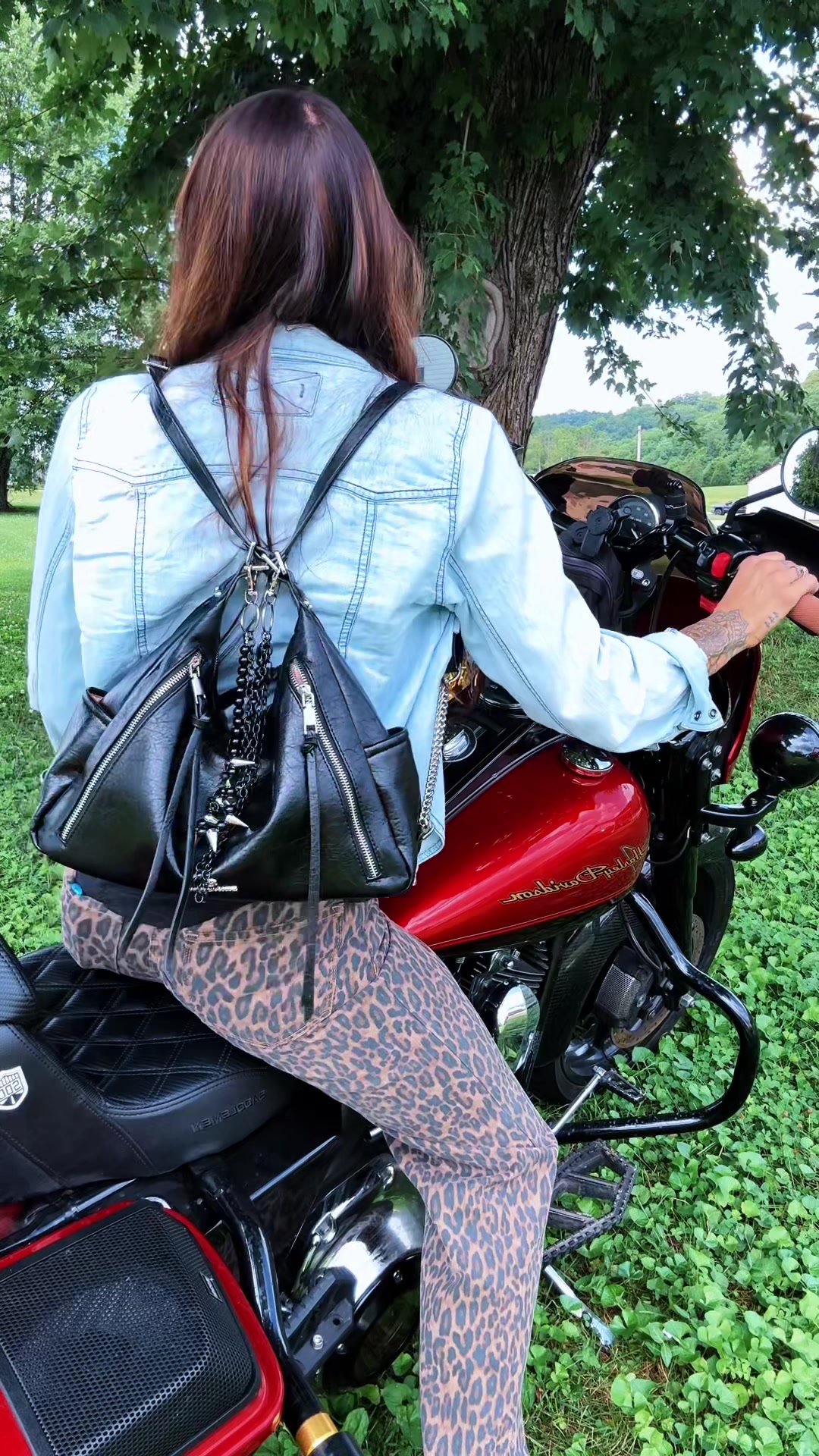 TikTok post by @omg_its_emy for Iris And Rainbow. Caption reads: Lady bikers this bag is a must 💅 @Rainbow....