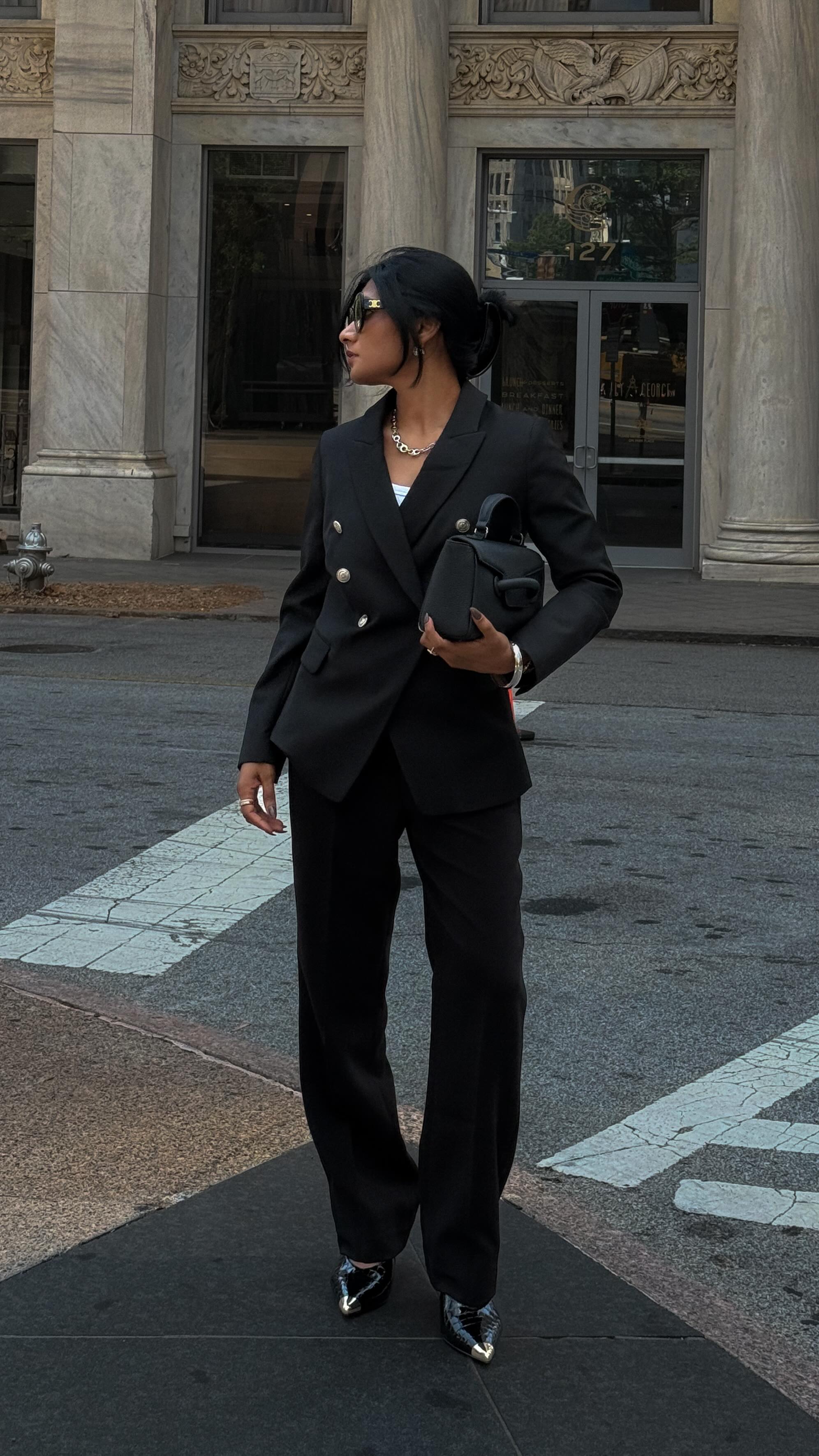 Instagram post by @kanchanalle for White House Black Market. Caption reads: Proof that the perfect @whbm black pant exists....