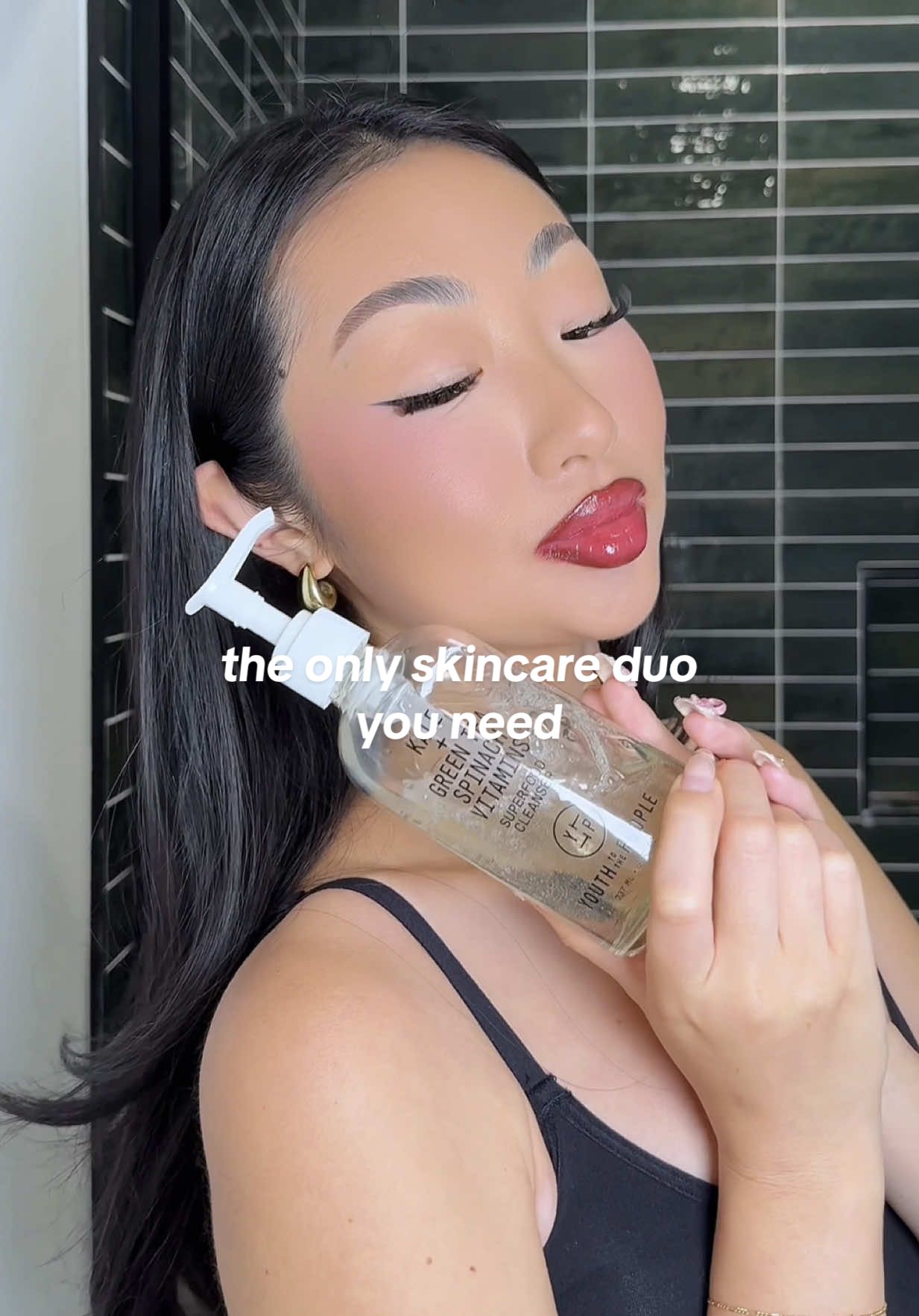 TikTok post by @itsbabykelz for Youth To The People. Caption reads: skincare overconsumption is so real 😭 honestly my....