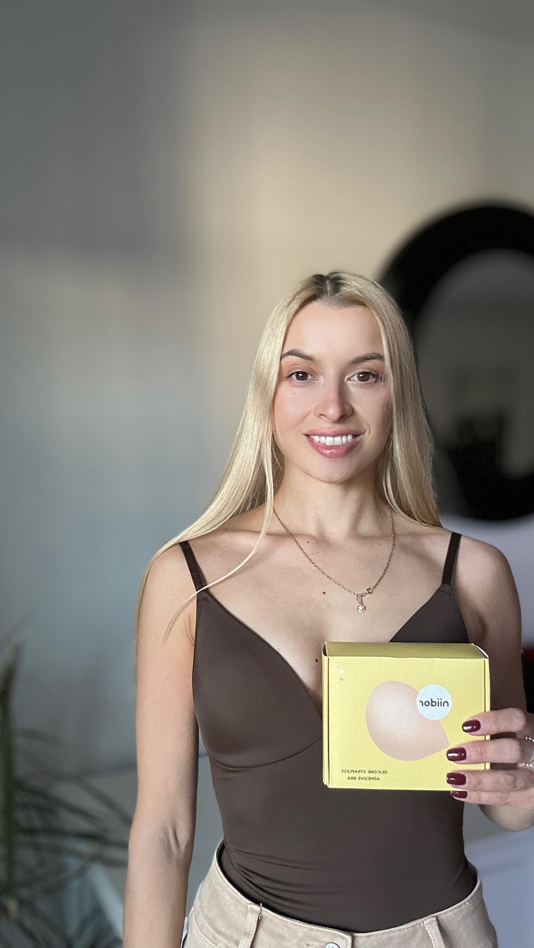 Instagram post by @volha_creative for Niidor. Caption reads: [...] finding the perfect invisible bra?
The....