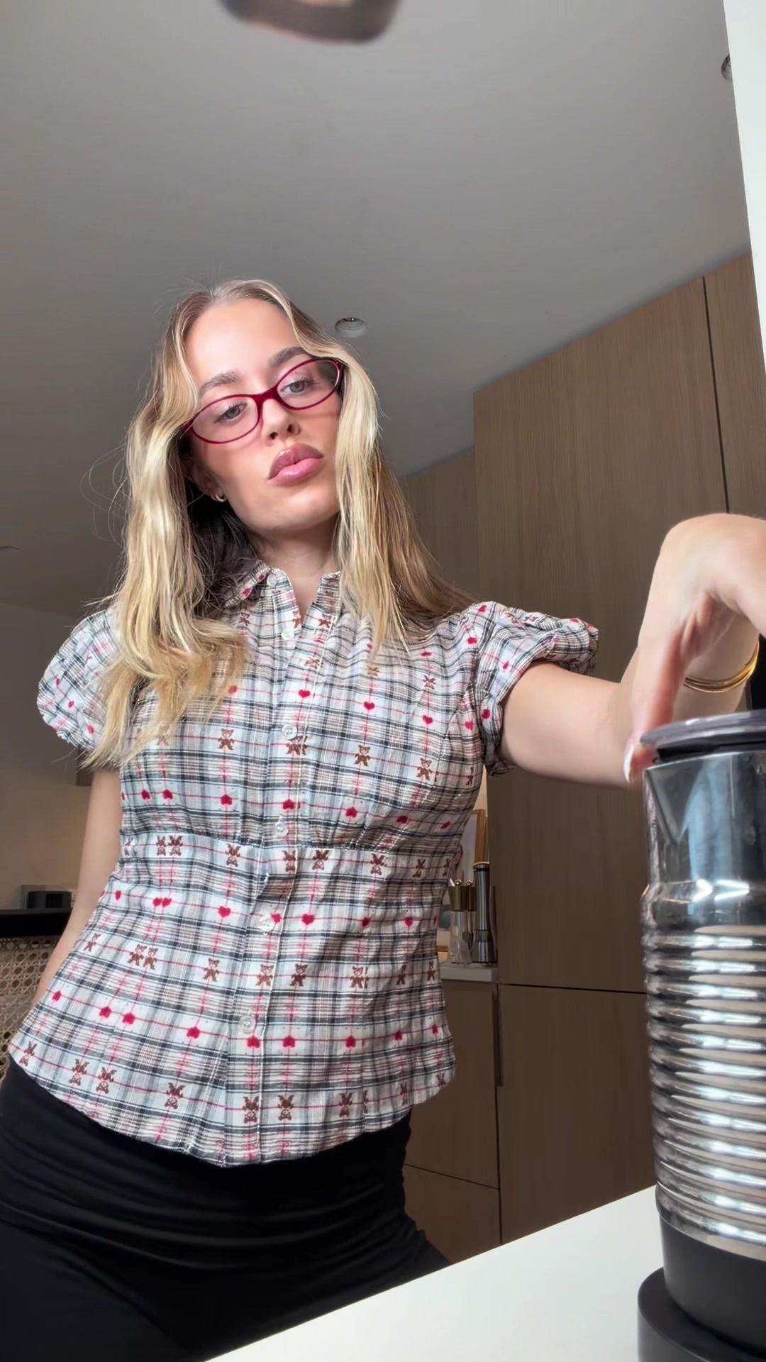 TikTok post by @lottietomlinson for Alpro. Caption reads: AD upgrading my oat latte to a cinnamon roll....