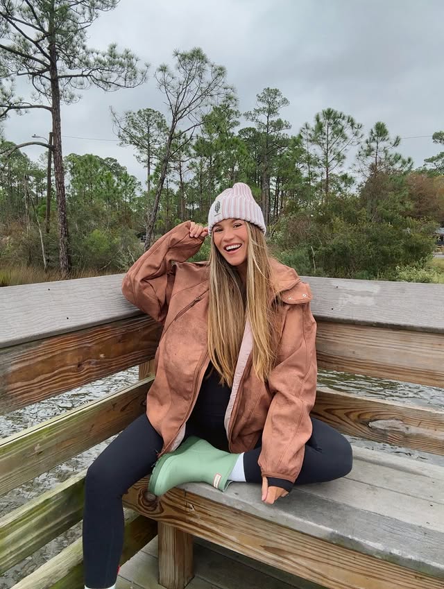 Instagram post by @brynley.joyner for FP Movement. Caption reads: [...] make the rules!!! ☔️🥾 

head to toe....