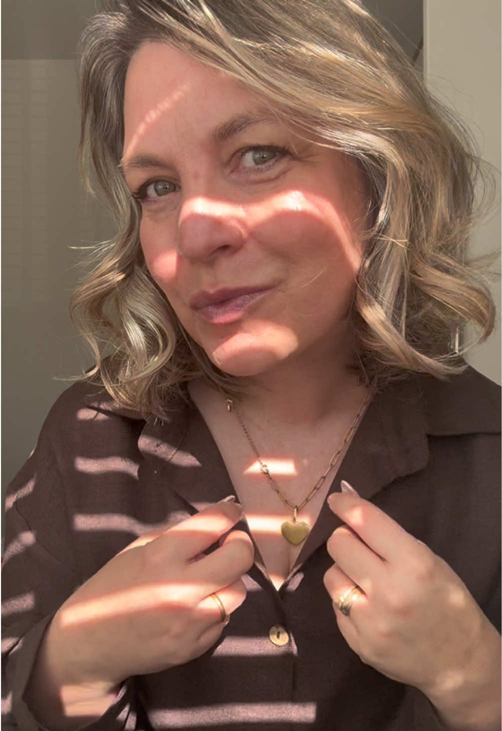 TikTok post by @all_things_leah for Landot Beauty. Caption reads: [...] impressed with this hair tool #fyp....