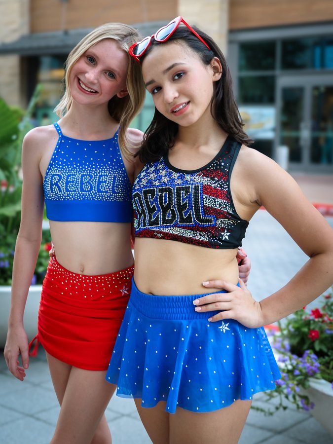 Instagram post by @cheermeon.olivia for Rebel Athletic. Caption reads: 💙🤍❤️Happy Labor Day!❤️🤍💙

@rebelathleticgirls....