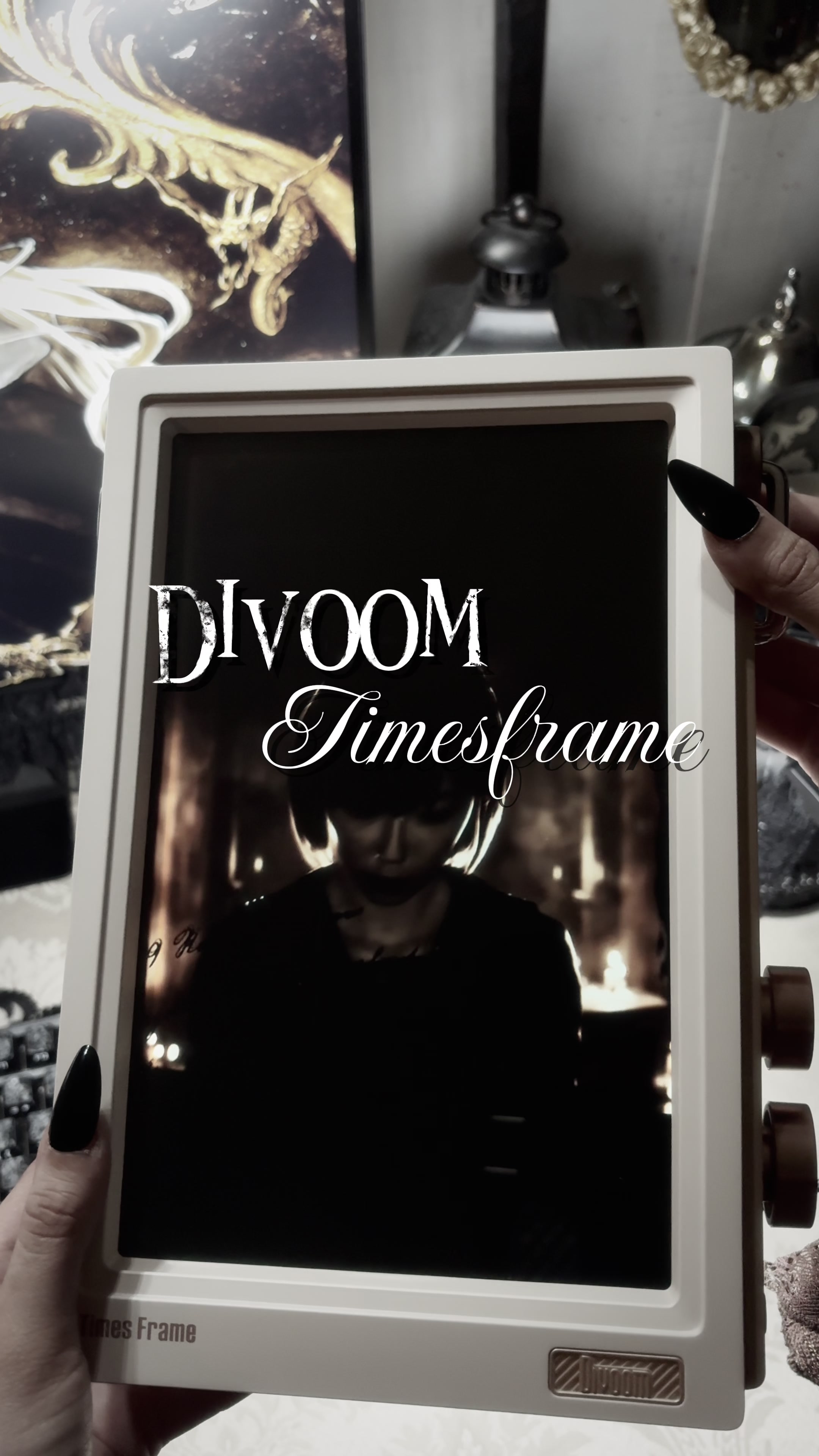 TikTok post by @kaylinlynell for Divoom. Caption reads: ⁺‧₊ ཐི⋆♱ say hello to the @Divoom timesframe 🎼🤍....