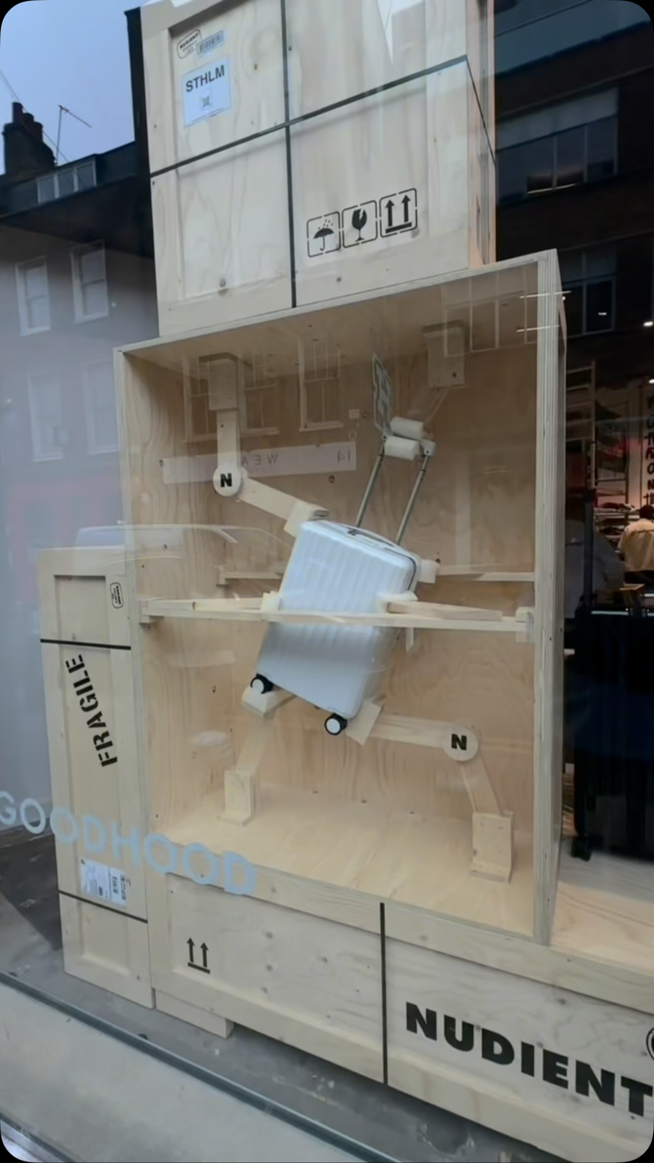 Instagram post by @snilcaasi for NUDIENT. Caption reads: come with me to pick up my @nudient suitcase 😍....