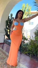 Instagram post by @misssperu for AMICLUBWEAR. Caption reads: Walking barefoot on these Spanish tiles, feeling a....