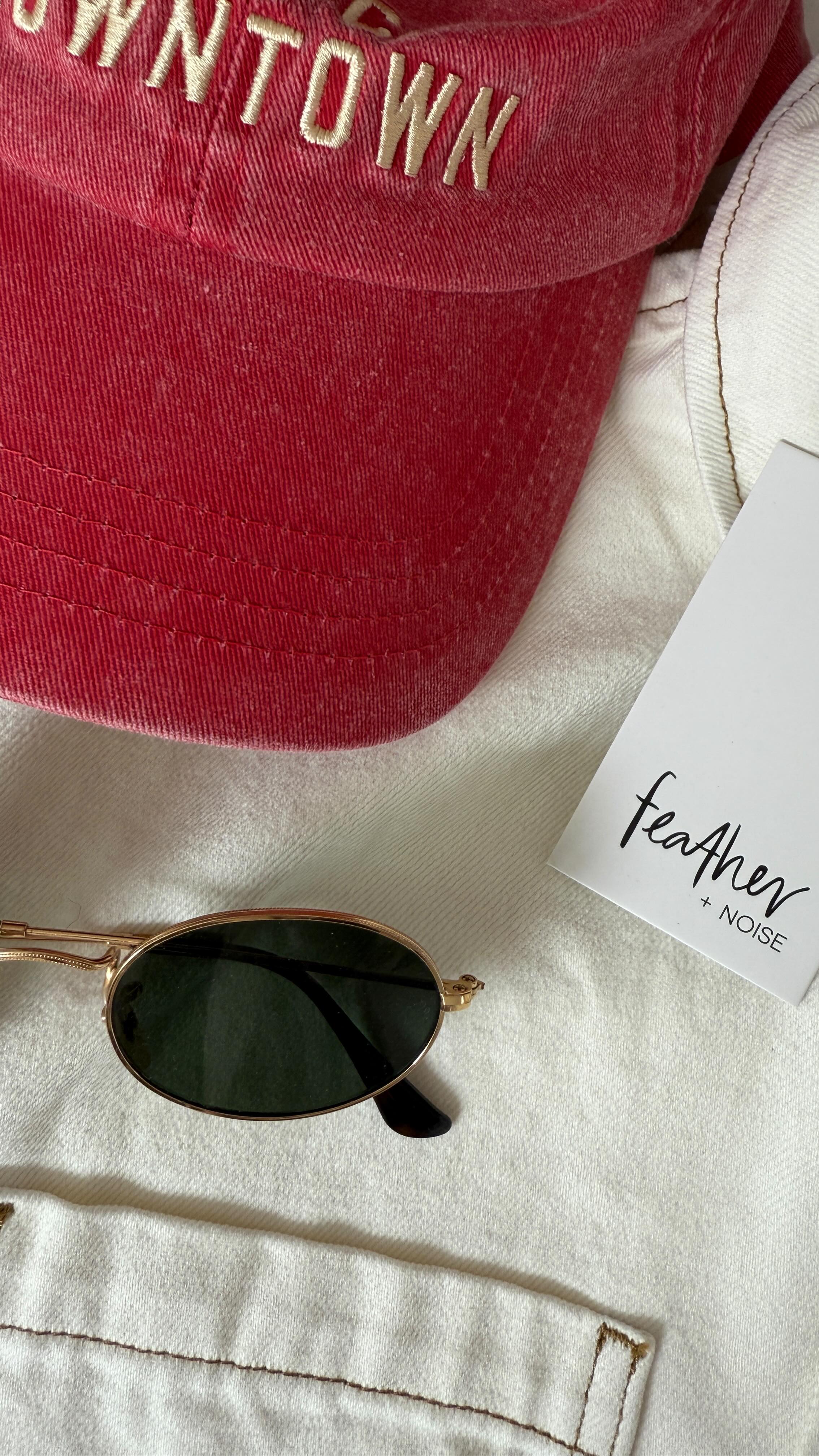 Instagram post by @emkellywears for Feather + Noise. Caption reads: I have these @featherandnoise jeans in 3 colours....