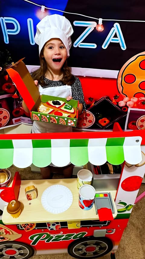 Instagram post by @gorjess.moments for Melissa & Doug. Caption reads: #ad The Melissa & Doug wooden pizza cart is our....