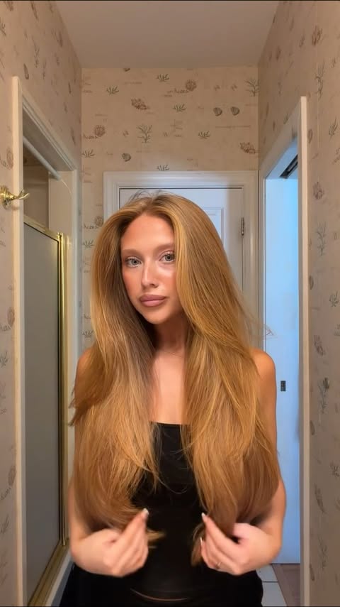 Instagram post by @carolinemalloy for Revlon Hair Tools. Caption reads: [...] best hair in the room 🍯🍓💆🏼‍♀️✨....