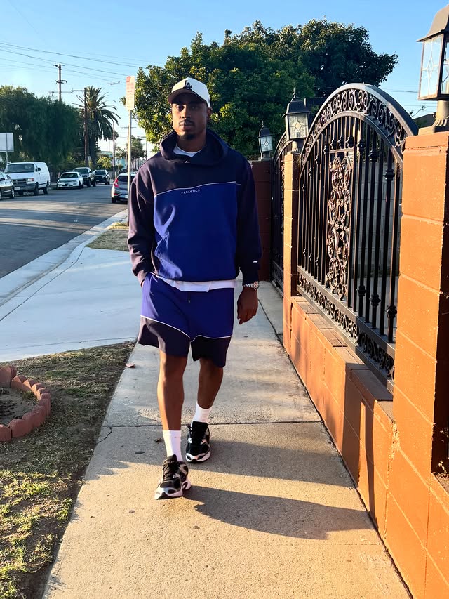 Instagram post by @richard__nevels for Fabletics Men. Caption reads: [...] in LA. Old caption new threads @fableticsmen....