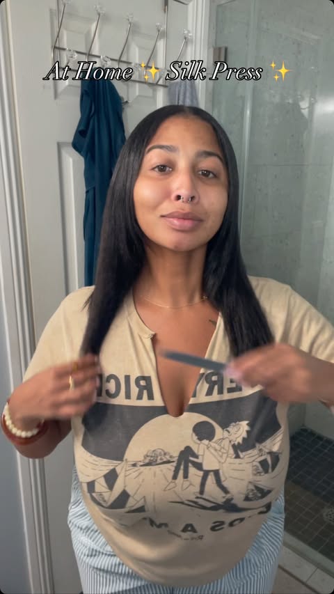 Instagram post by @jusslin_ for OGX Beauty. Caption reads: At home silk press 💁🏽‍♀️

✨ @ogx_beauty....