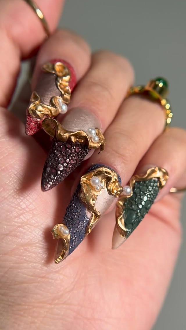 Instagram post by @nailsbynethan for Madam Glam. Caption reads: 🍂✨ Cozy up to fall’s warmest whispers with Madam....