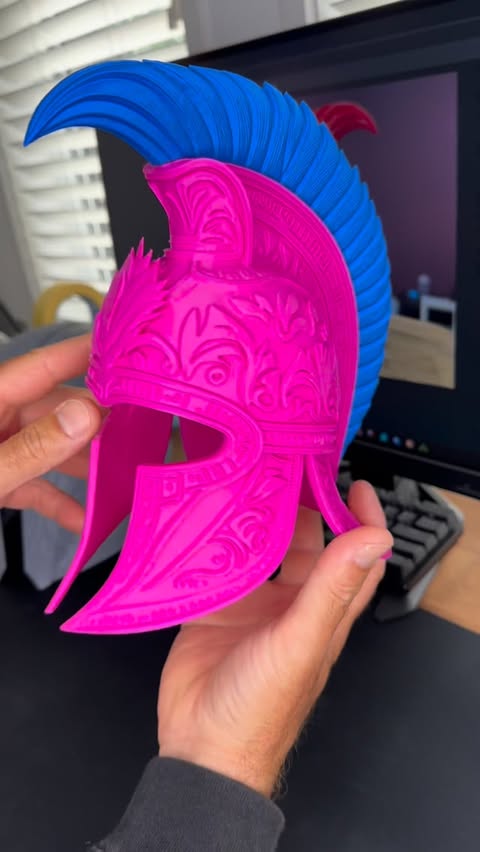 Instagram post by @3d__encounter for Bambu Lab. Caption reads: Sparta Helmet from Makerworld.com printed on the....