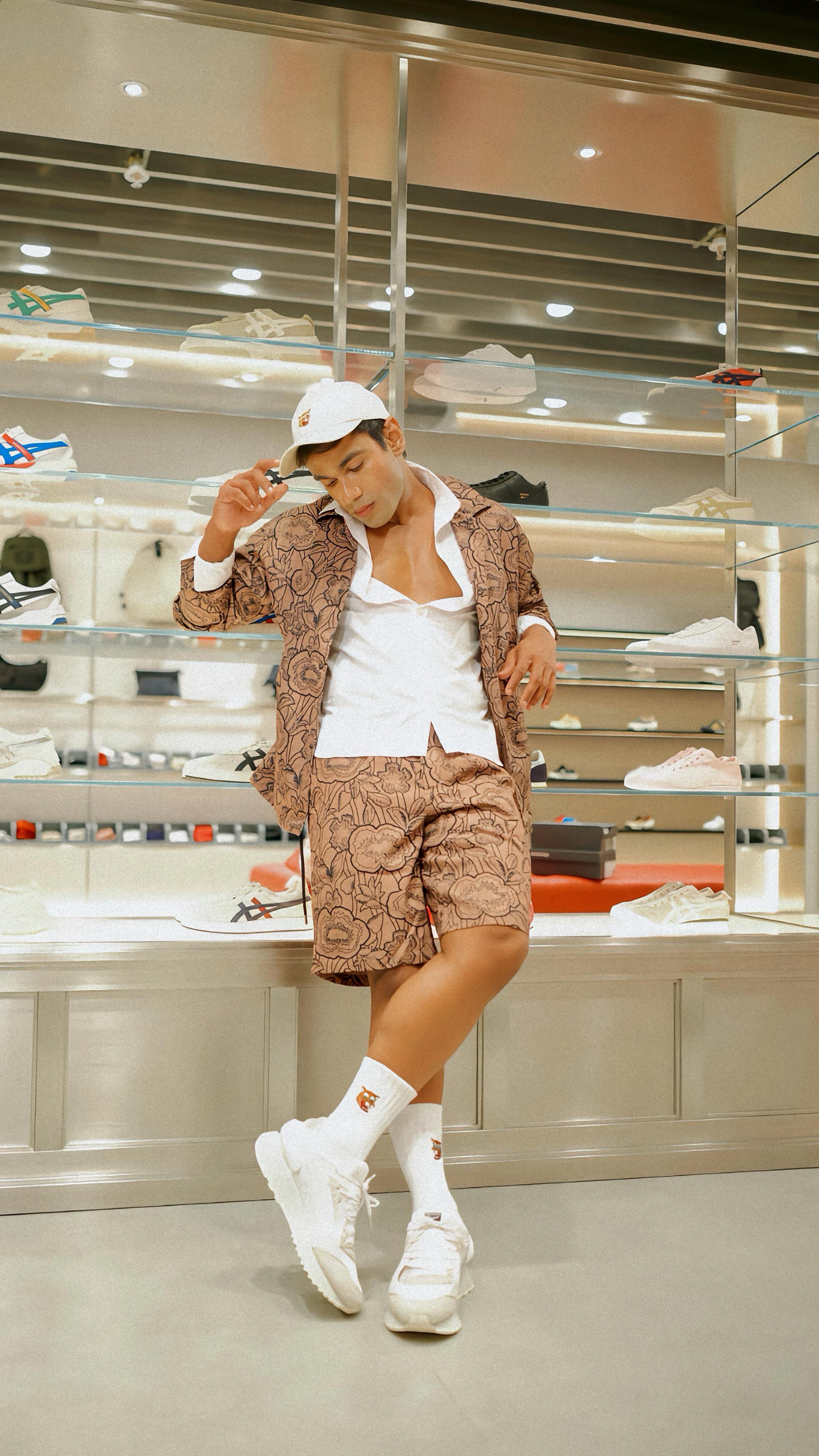 Instagram post by @theorangeepistles for Onitsuka Tiger. Caption reads: Stepping into style at the newly opened Onitsuka....