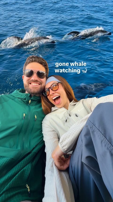 Instagram post by @travelersforgood for Cotopaxi. Caption reads: going whale watching with @cotopaxi 🐋💦 dressing....
