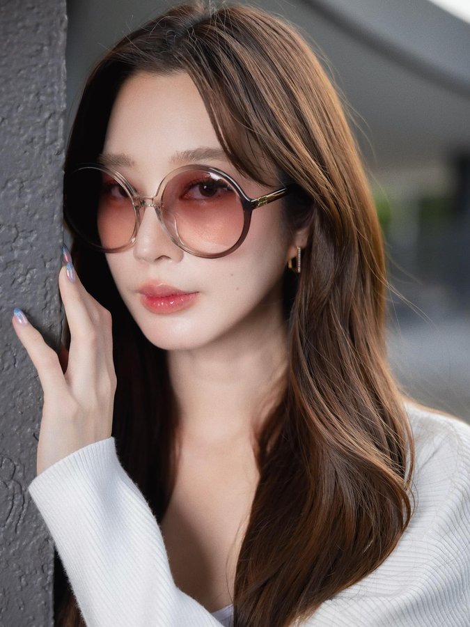 Instagram post by @thivaritthisa for EssilorLuxottica. Caption reads: @miumiu @essilorluxottica 

#MiuMiuEyewear.