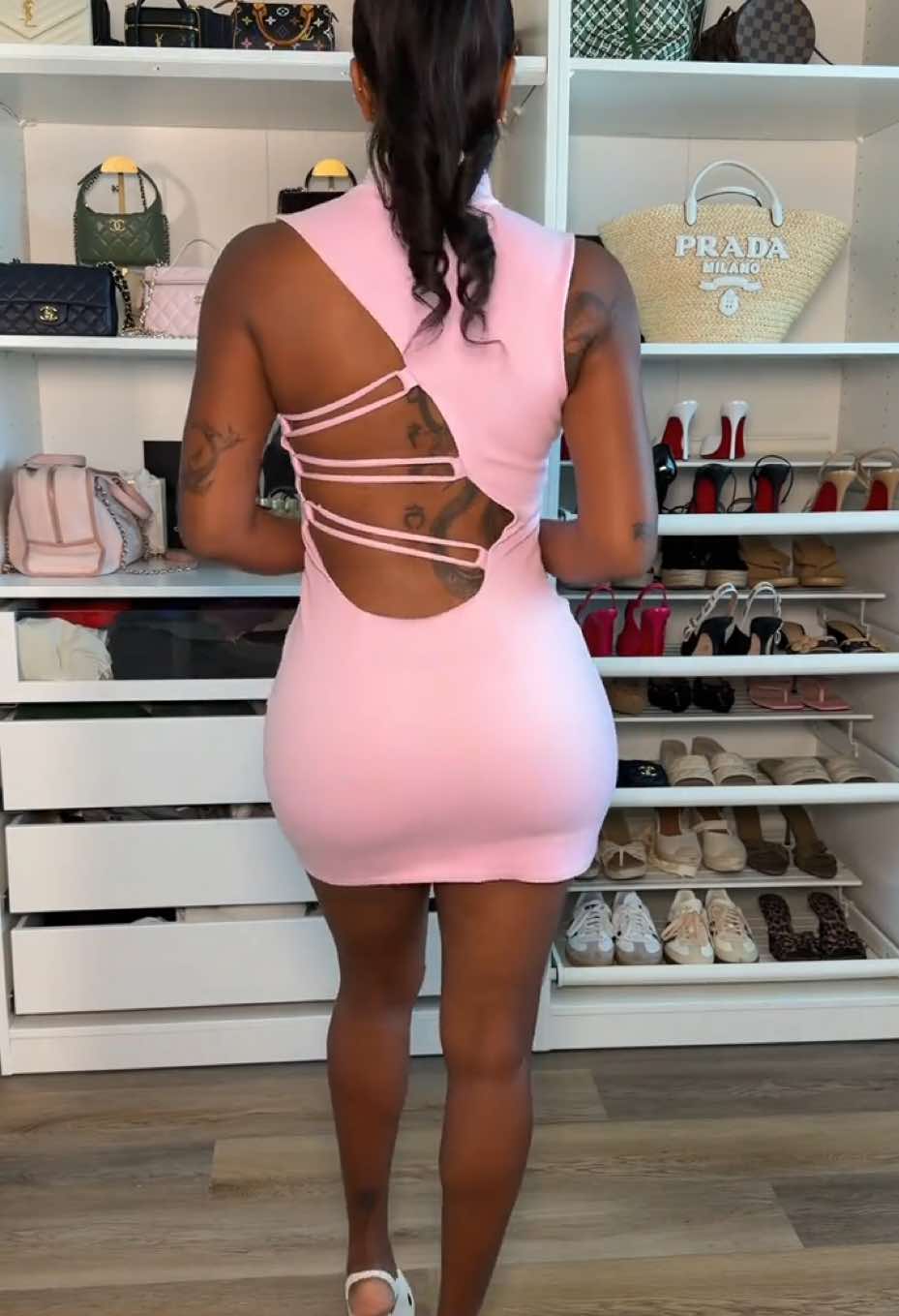 TikTok post by @aanastatia for Naked Wardrobe. Caption reads: @Naked Wardrobe ate with this dress [...].