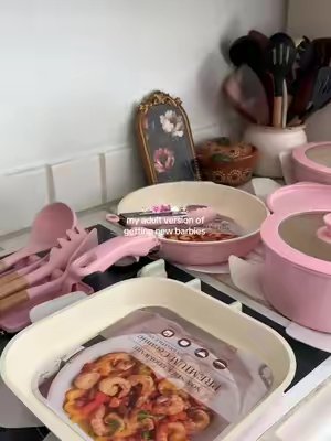 TikTok post by @lidianortegarubio for Astercook. Caption reads: [...] building their dream pink kitchen 🎀....