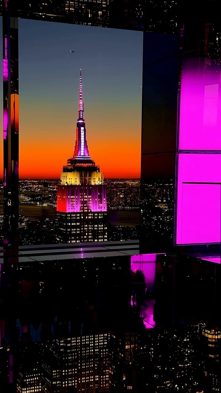 Instagram post by @enchantedbluenyc for Passion Passport. Caption reads: Catch a vibe in the New York City sky at @summitov....
