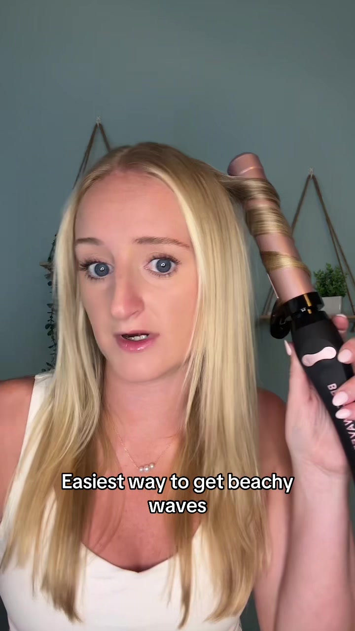 TikTok post by @devinris for Beachwaver. Caption reads: [...] rotating curling iron😍 @TheBeachwaver....