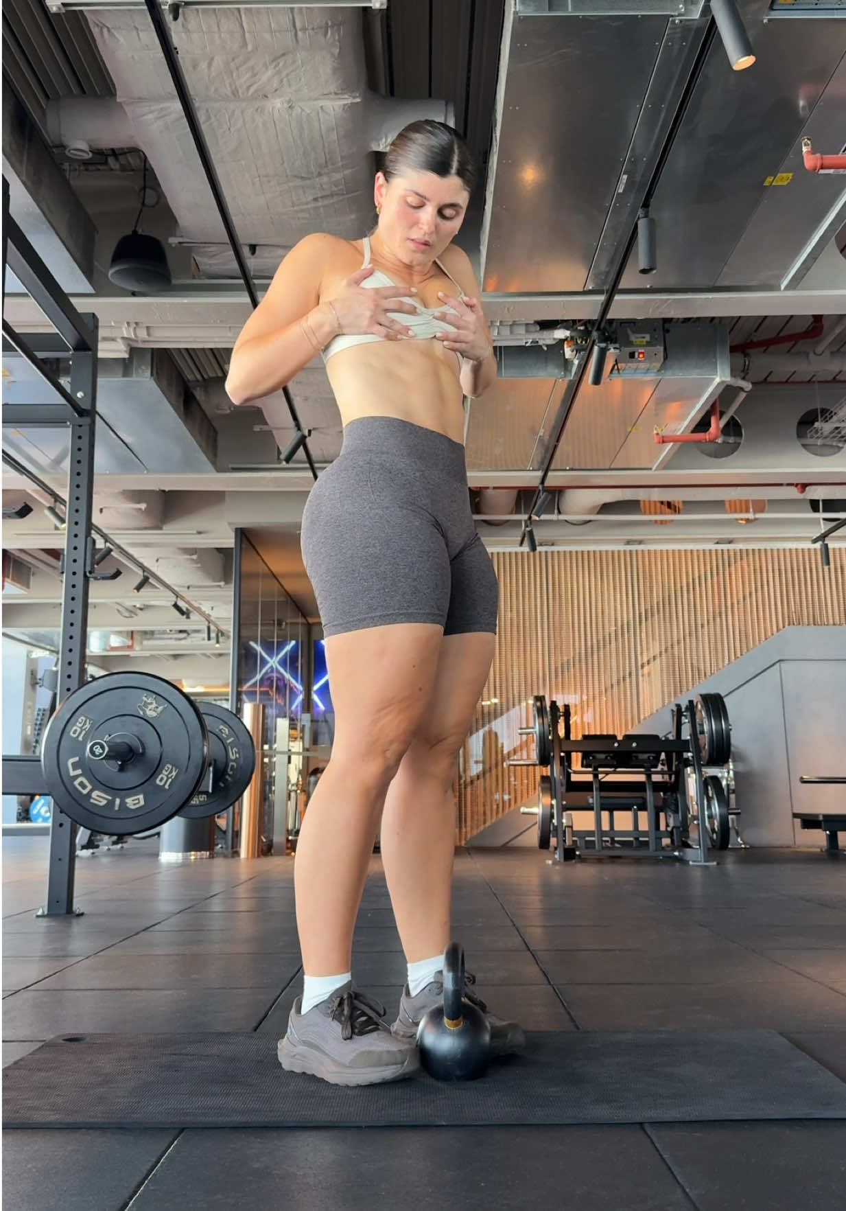 TikTok post by @livefitelle for GHOST® Energy. Caption reads: [...] 👙☀️ Fuelled by @GHOST LIFESTYLE....