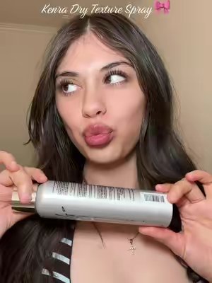 TikTok post by @flores.2002 for Kenra Professional. Caption reads: [...] been loving this texture spray @Kenra....