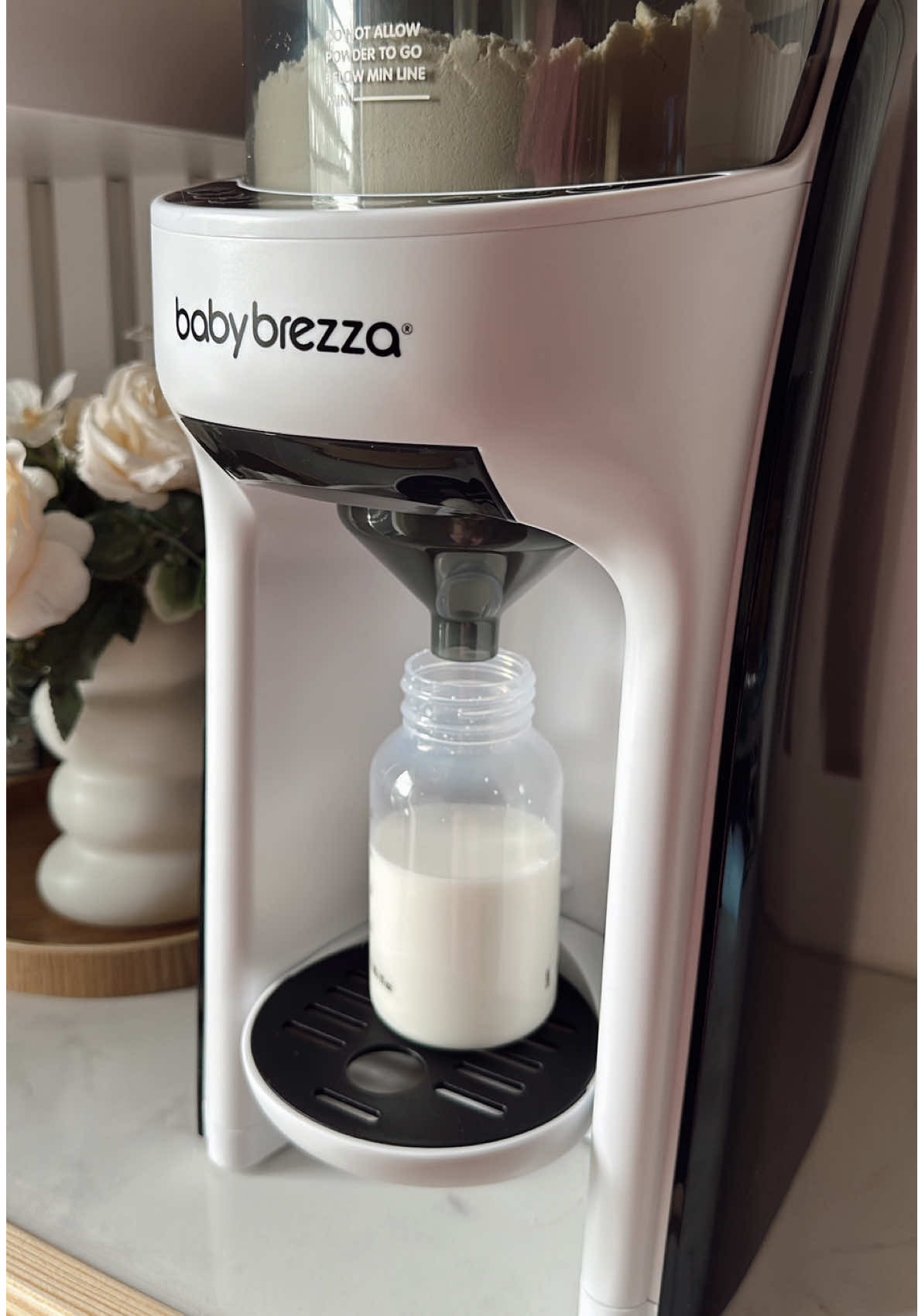 TikTok post by @aj.vr00 for Baby Brezza. Caption reads: It looks magical but it's @Baby Brezza 🪄 Baby....