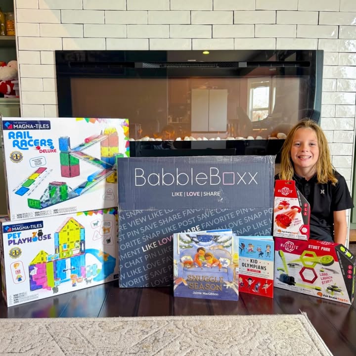 Instagram post by @dunnfamilyfun for BabbleBoxx. Caption reads: #ad @babbleboxx Holiday Gift Guide for kids! These....