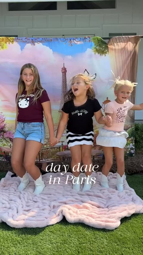 Instagram post by @madimay__ for Hello Kitty. Caption reads: #Ad Okay fine… it’s not Paris. It’s backyard with....