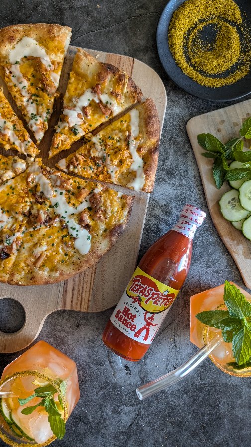 Instagram post by @tfimb for Texas Pete. Caption reads: [...] hot lemon pepper chicken pizza with....