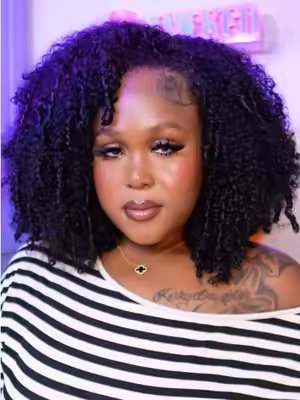 TikTok post by @itskyraie for Tinashe Hair. Caption reads: Afro Curly 😩 @tinashehair #naturalhair....