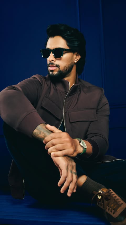 Instagram post by @tilakvarma9 for John Jacobs Eyewear. Caption reads: [...] true - on and off the field with....