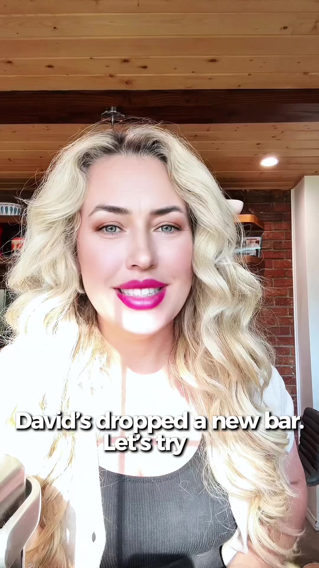 TikTok post by @sarahlingordon for David Protein. Caption reads: David protein bar, high protein snack, [...].