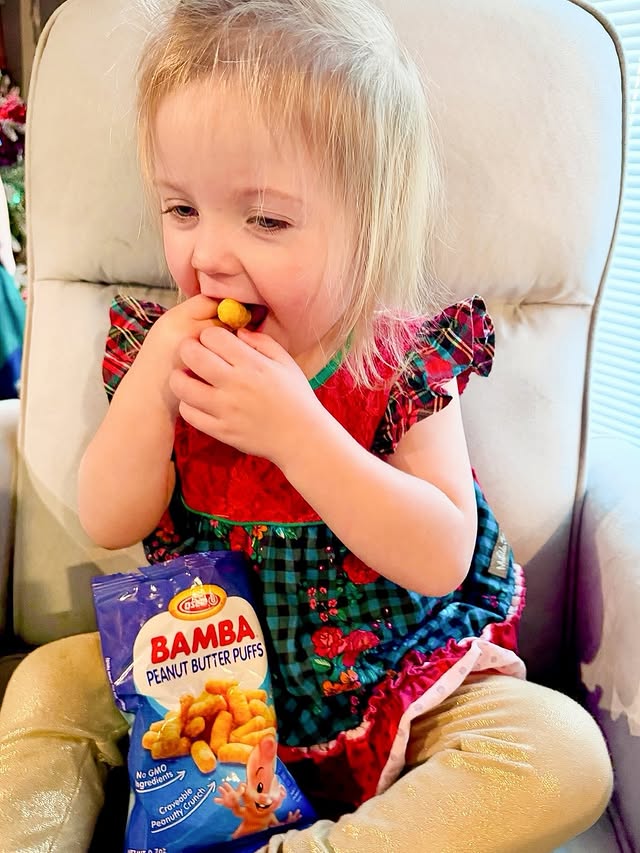 Instagram post by @dunnfamilyfun for MomSelect. Caption reads: Santa, bring backup… we’re running low on Bamba....