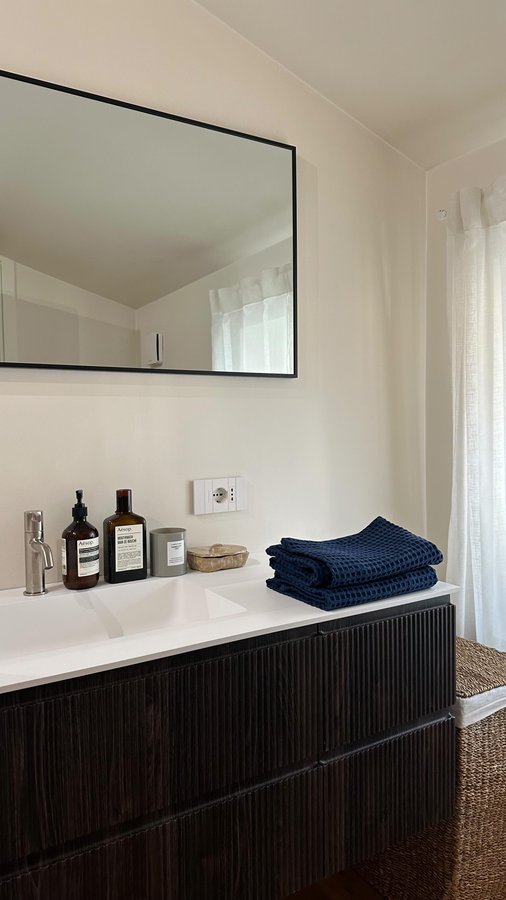 Instagram post by @claudiasplanet_ for Dalfilo. Caption reads: Bathroom refresh with @dalfilo.official 
New....