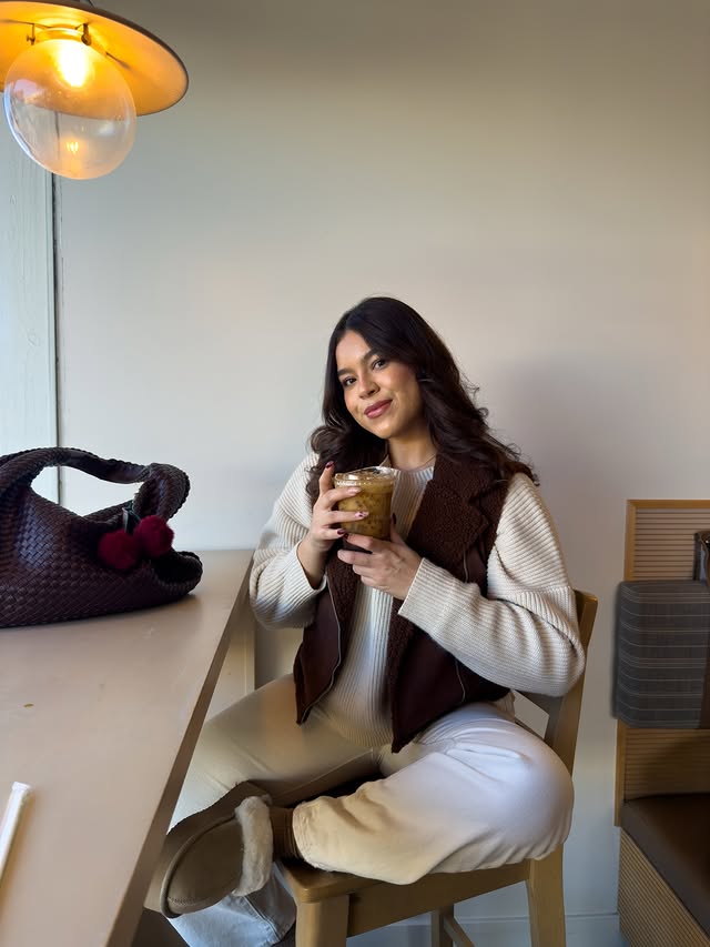 Instagram post by @stephyglezz for JustFab. Caption reads: Cozy slippers are my go to 🧸🤍🤎 @justfabonline....