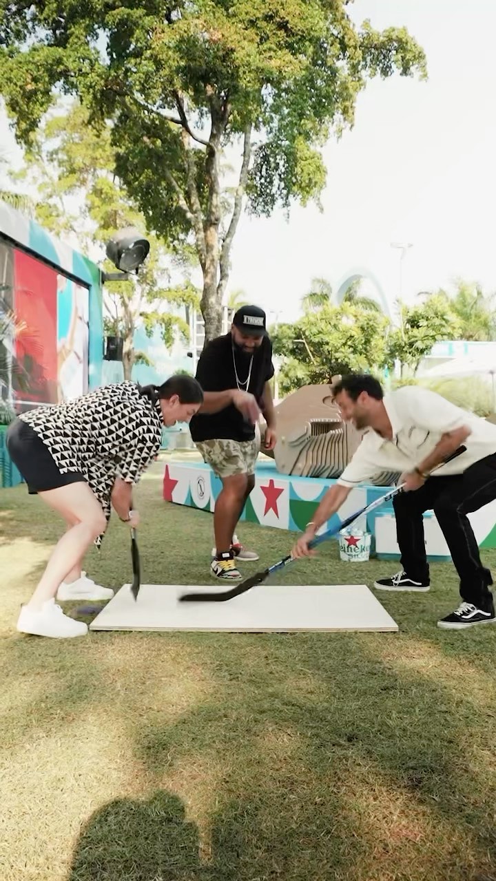 Instagram post by @hilaryknight for Heineken US. Caption reads: 🚨I think we found a new face-off specialist.....