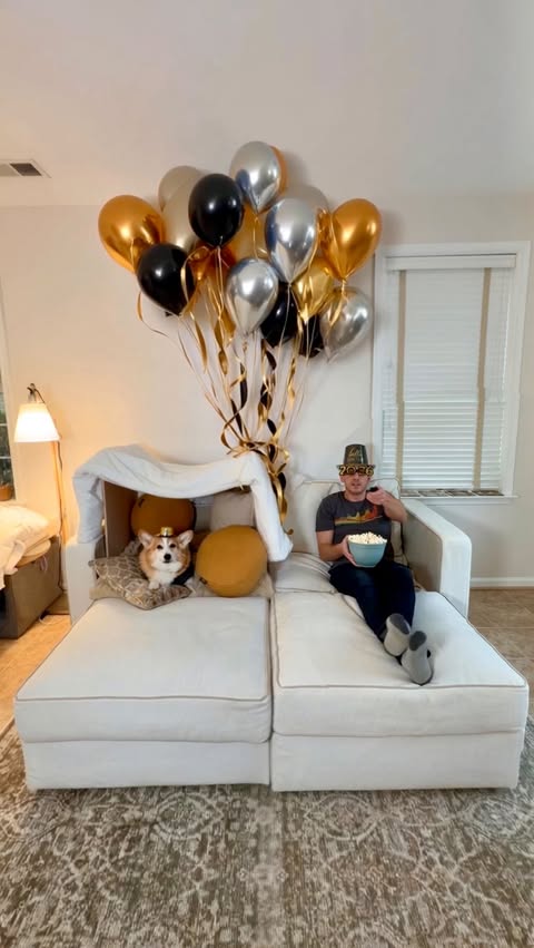 Instagram post by @hammyandolivia for Lovesac. Caption reads: [...] going to watch the ball drop from our....