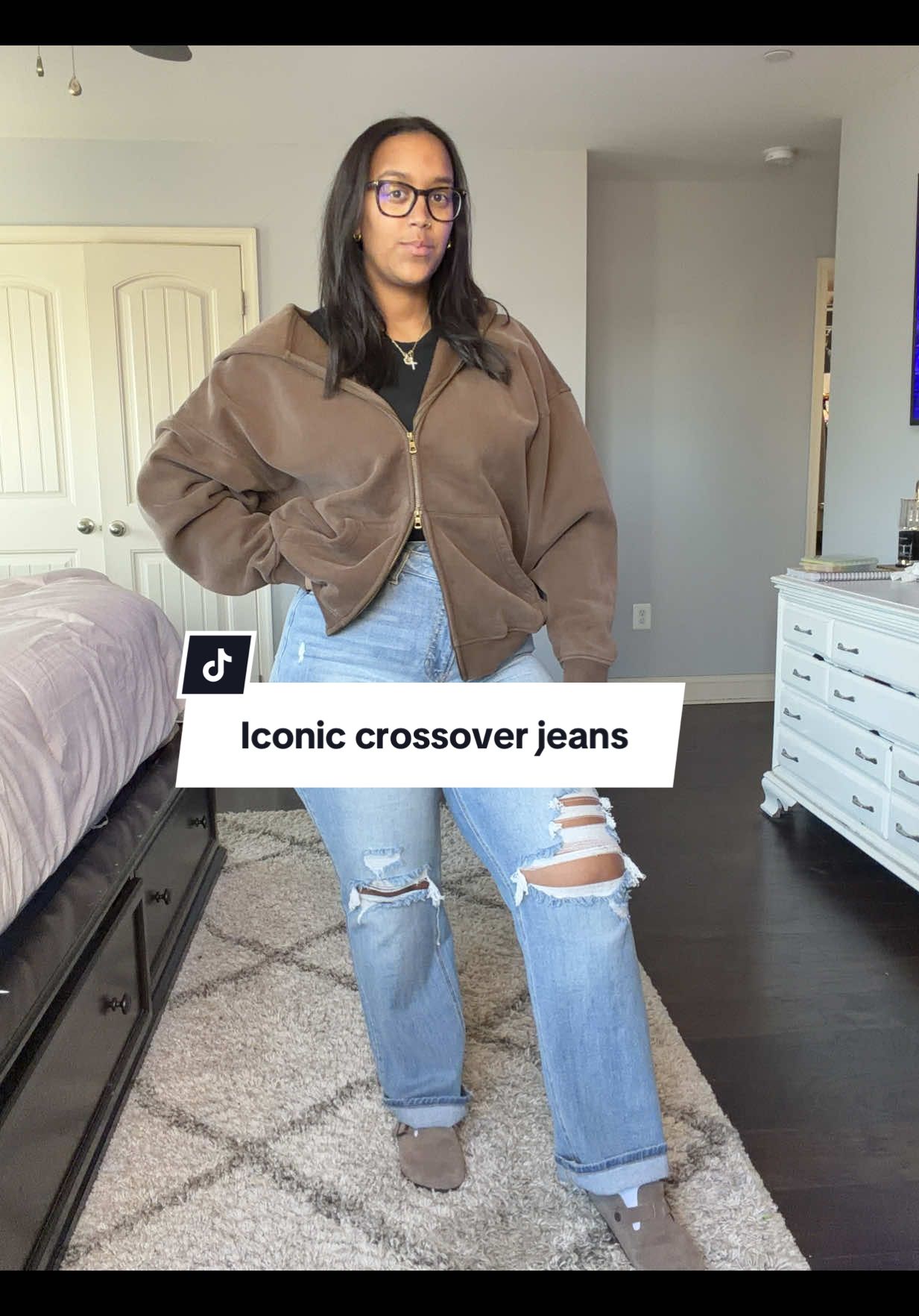 TikTok post by @mykasfinds for Fashion Nova. Caption reads: [...] on my crossover jeans @Fashion Nova #jeans....