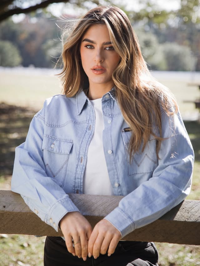 Instagram post by @kat.velasco.music for Wrangler. Caption reads: denim that can keep up. 🤍 
@wrangler.