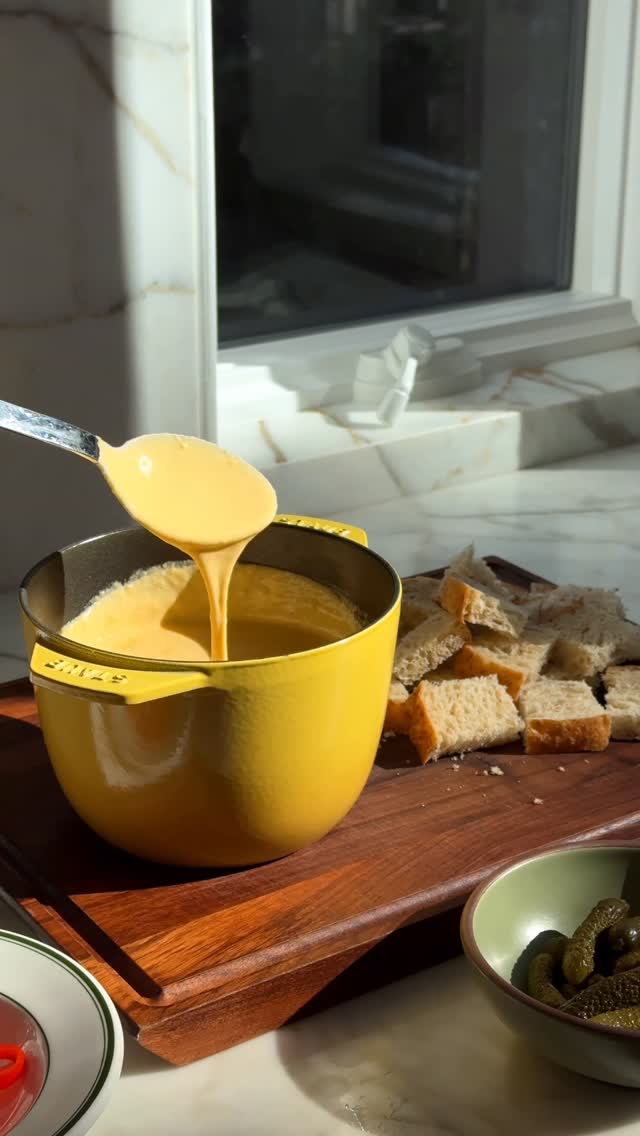 Instagram post by @justine_snacks for Tillamook. Caption reads: Excited to share a little movie night fondue with....